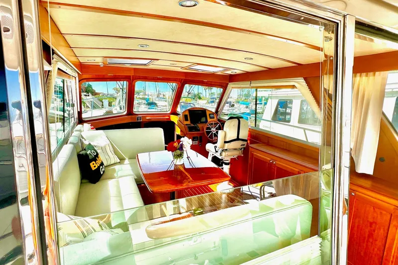 Slide: The Image of Interior of 2016 Sabre 38 Salon Express yacht with elegant seating and helm. - 4