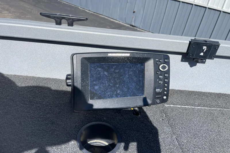 Slide: The Image of Fishfinder on 2016 Alumacraft Escape 145 Tiller boat, mounted on gray interior. - 3