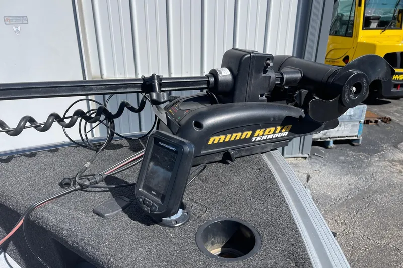 Slide: The Image of 2016 Alumacraft Escape 145 Tiller with Minn Kota Terrova trolling motor and Humminbird fish finder. - 4