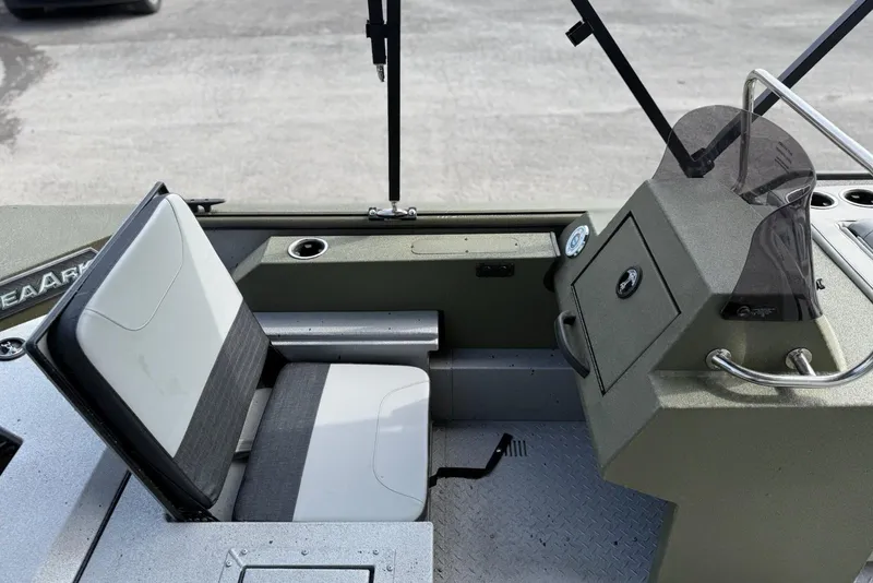 Slide: The Image of 2026 SeaArk Easy 200 boat interior with seating and control panel. - 11