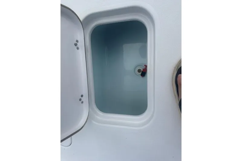 Slide: The Image of Open storage compartment on a 2017 Sportsman Masters 267 Bay Boat. - 10