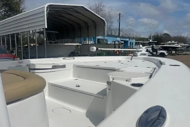 Slide: The Image of 2017 Sportsman Masters 267 Bay Boat, docked with covered storage and clear skies. - 20