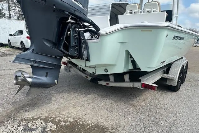 Slide: The Image of 2017 Sportsman Masters 267 Bay Boat on trailer, rear view with outboard motor. - 3
