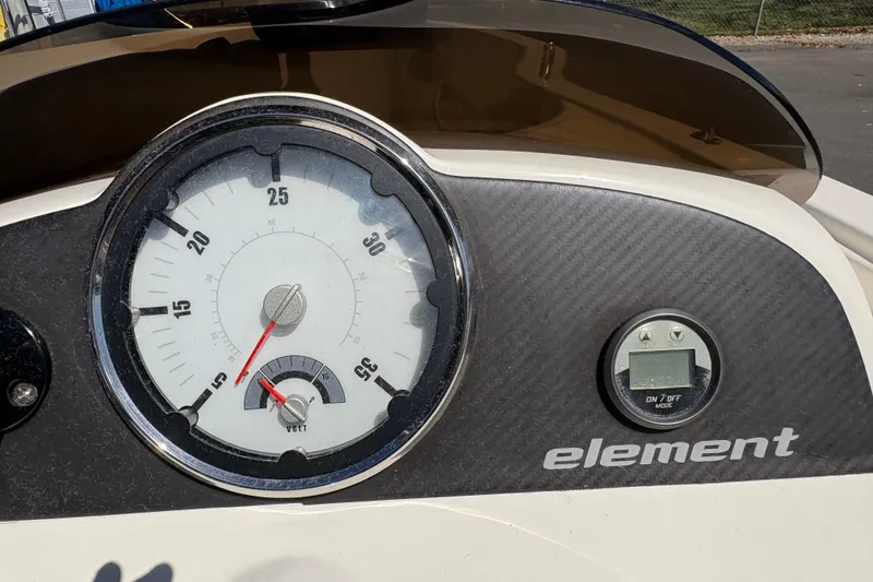 Slide: The Image of Dashboard of 2016 Bayliner 160 Bowrider with speedometer and digital display. - 9