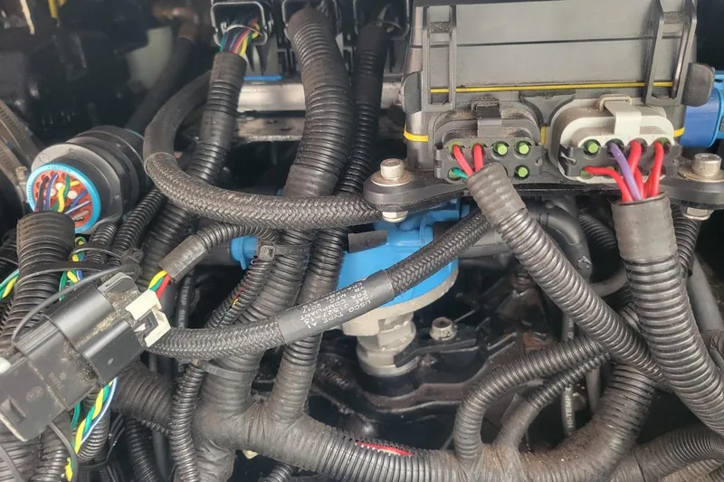 Slide: The Image of Close-up of 2001 Shamrock 220 Open engine wiring and connectors. - 35