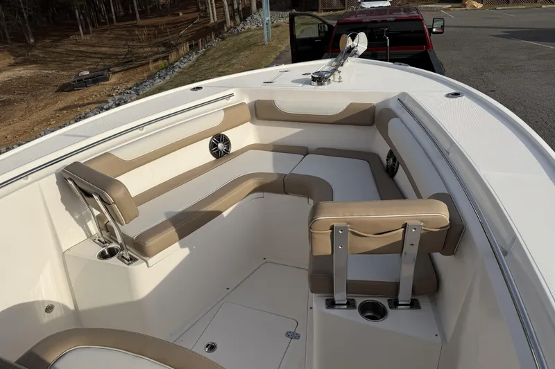 Slide: The Image of 2024 Sea Born SX239 Offshore boat with spacious seating and modern design. - 11