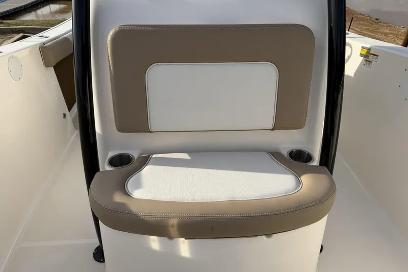 Slide: The Image of 2024 Sea Born SX239 Offshore boat seat with cup holders, beige and white upholstery. - 13