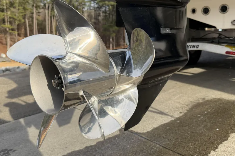Slide: The Image of 2024 Sea Born SX239 Offshore boat propeller, shiny and metallic, on a trailer. - 21