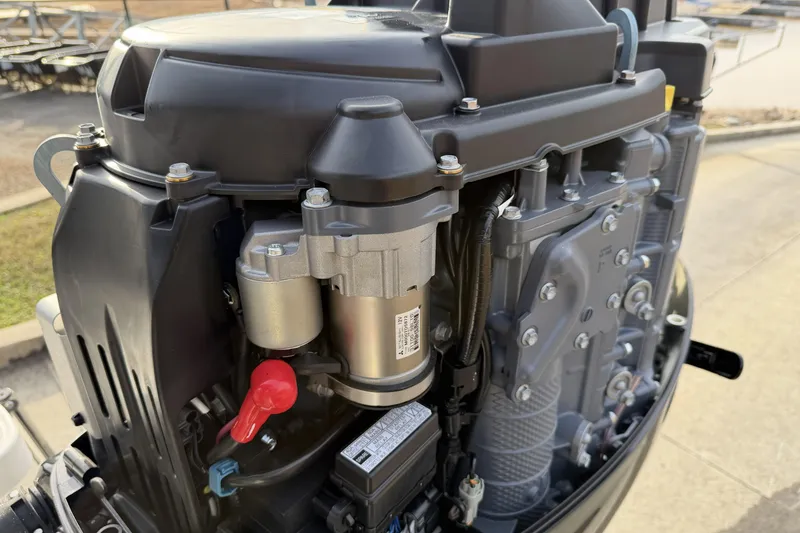 Slide: The Image of 2024 Sea Born SX239 Offshore engine close-up, showcasing detailed mechanical components. - 24