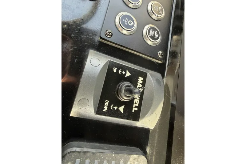 Slide: The Image of 2024 Sea Born SX239 Offshore boat control panel with Maxwell switch. - 27