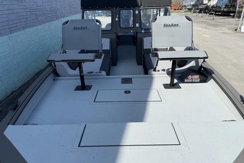 Slide: The Image of 2026 SeaArk EasyCat boat interior with seating and storage compartments. - 11