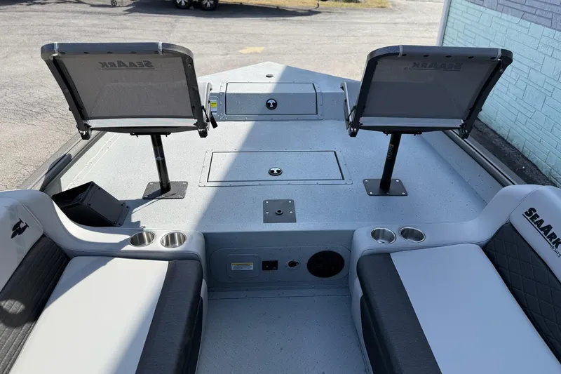 Slide: The Image of 2026 SeaArk EasyCat boat interior with seating and storage compartments. - 12
