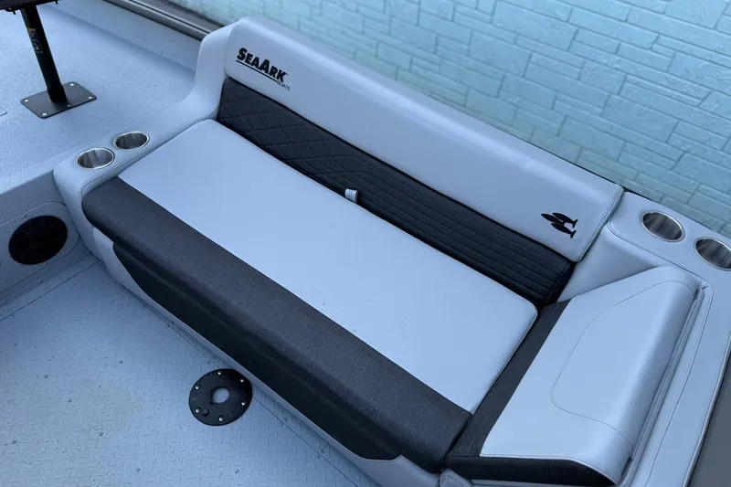 Slide: The Image of 2026 SeaArk EasyCat boat seating with cup holders and stylish upholstery. - 13