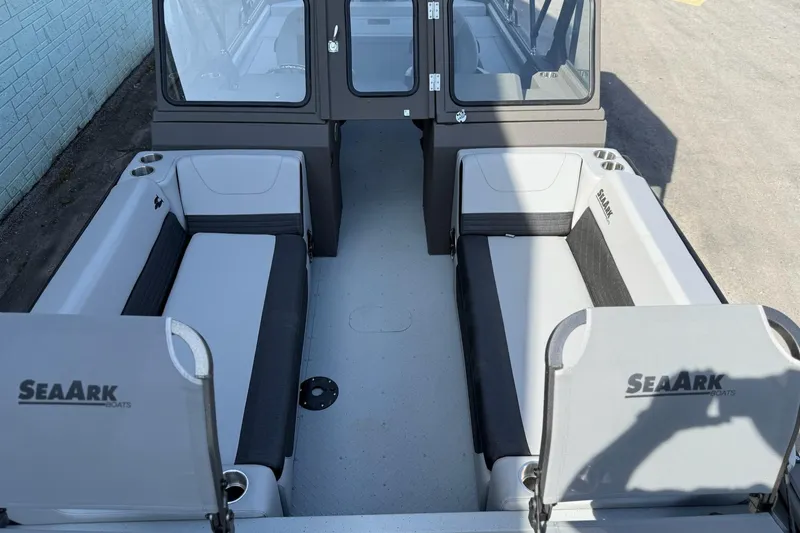 Slide: The Image of 2026 SeaArk EasyCat boat interior with seating and cup holders. - 15