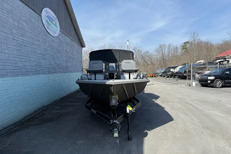 Slide: The Image of 2026 SeaArk EasyCat boat on trailer at Water World Marine dealership. - 3