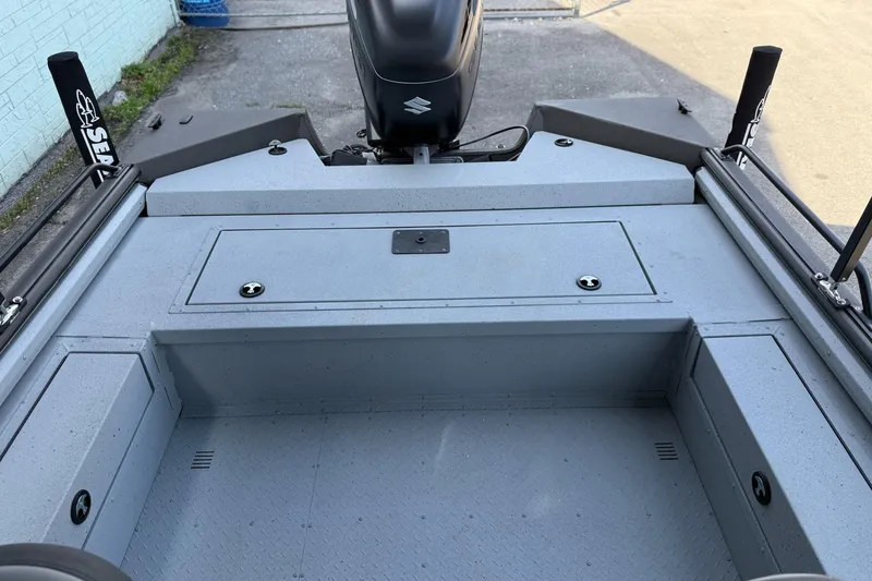 Slide: The Image of 2026 SeaArk EasyCat boat interior with Suzuki motor, featuring storage compartments and non-slip flooring. - 9