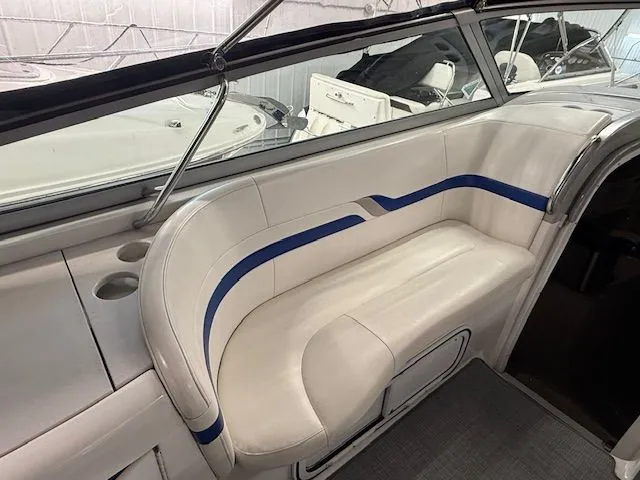 Slide: The Image of Interior of a 2001 Formula 370 Super Sport with white and blue seating. - 13