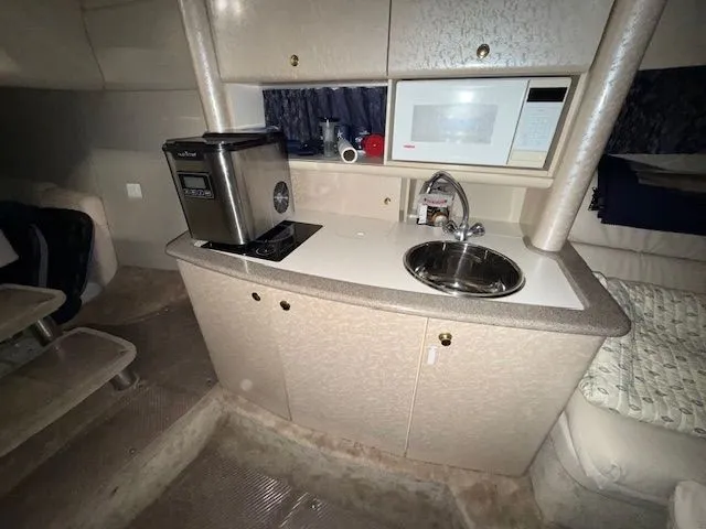 Slide: The Image of Interior of 2001 Formula 370 Super Sport yacht with kitchenette. - 17