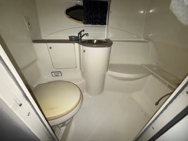 Slide: The Image of Bathroom in 2001 Formula 370 Super Sport boat. - 18