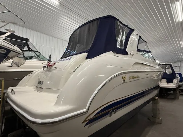 Slide: The Image of 2001 Formula 370 Super Sport boat in storage facility. - 2