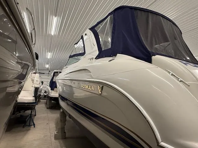 Slide: The Image of 2001 Formula 370 Super Sport boat in storage facility. - 3