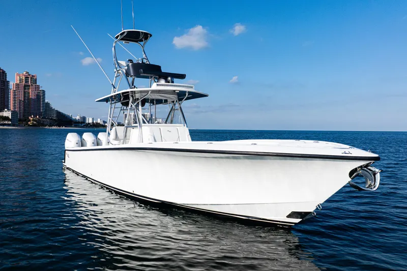 The Image of 2020 SeaVee 390Z boat on open water, featuring multiple outboard engines. - 0