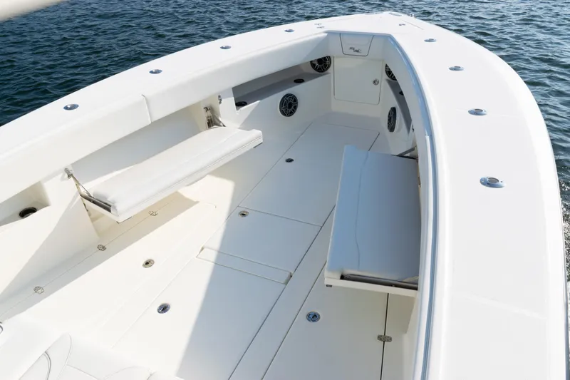 Slide: The Image of 2020 SeaVee 390Z boat interior with seating, on calm water. - 11