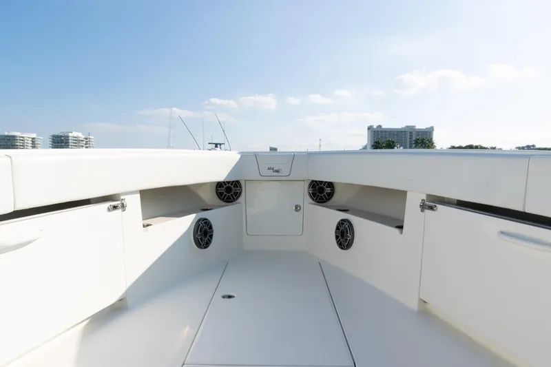 Slide: The Image of 2020 SeaVee 390Z boat interior with speakers and storage compartments. - 17