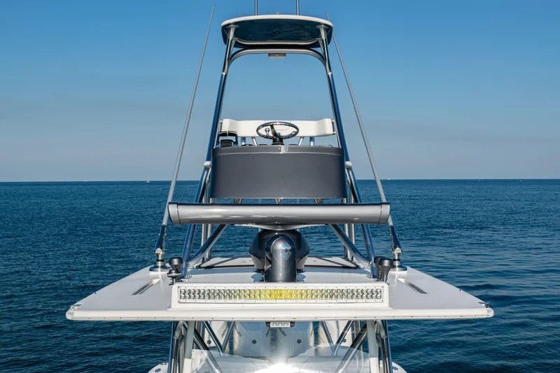 Slide: The Image of 2020 SeaVee 390Z boat on calm ocean with clear blue sky. - 22