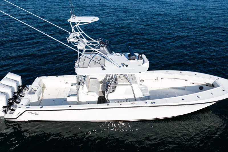 Slide: The Image of 2020 SeaVee 390Z boat with quad engines on open water. - 3