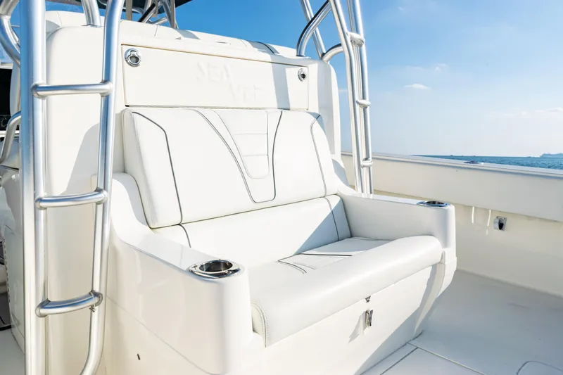 Slide: The Image of 2020 SeaVee 390Z boat with white seating and ocean view. - 31