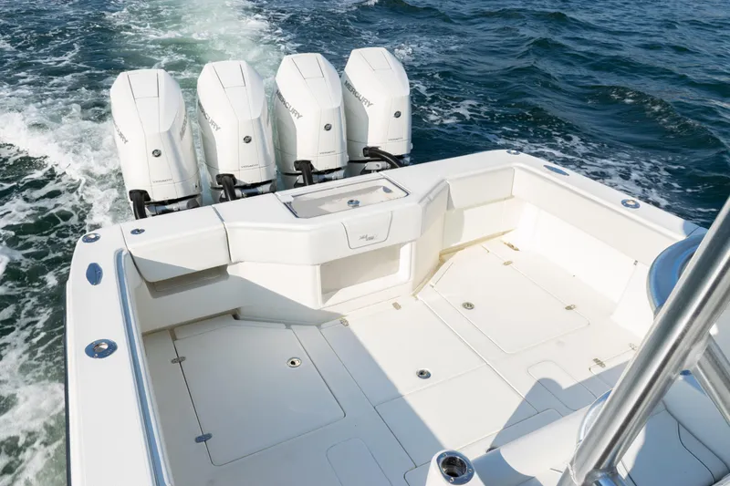 Slide: The Image of 2020 SeaVee 390Z boat with four Mercury outboard engines on open water. - 40