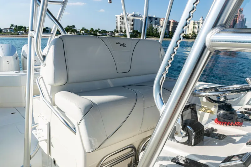 Slide: The Image of 2020 SeaVee 390Z boat interior with white seating and stainless steel frame. - 41