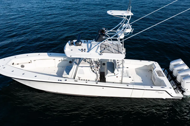 Slide: The Image of 2020 SeaVee 390Z boat on water, featuring multiple outboard engines. - 42