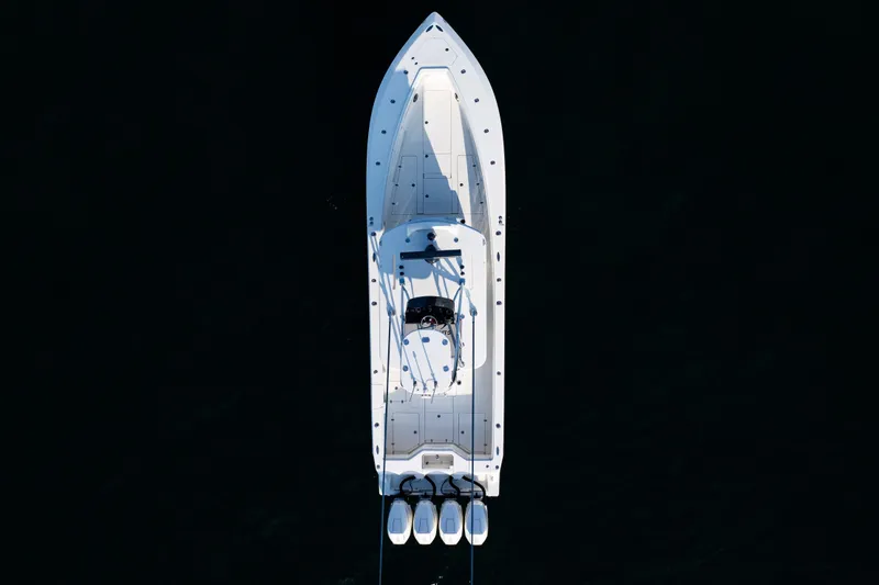Slide: The Image of Aerial view of 2020 SeaVee 390Z boat on dark water. - 43
