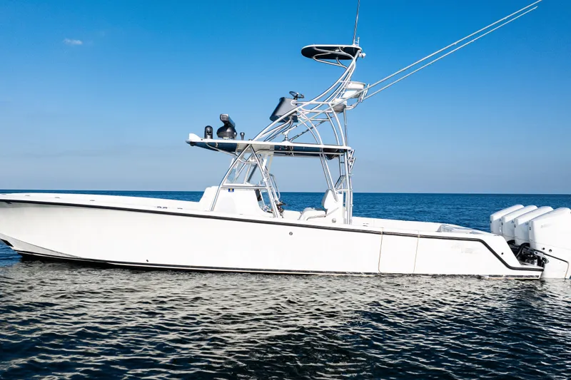 Slide: The Image of 2020 SeaVee 390Z boat on calm ocean under clear blue sky. - 5