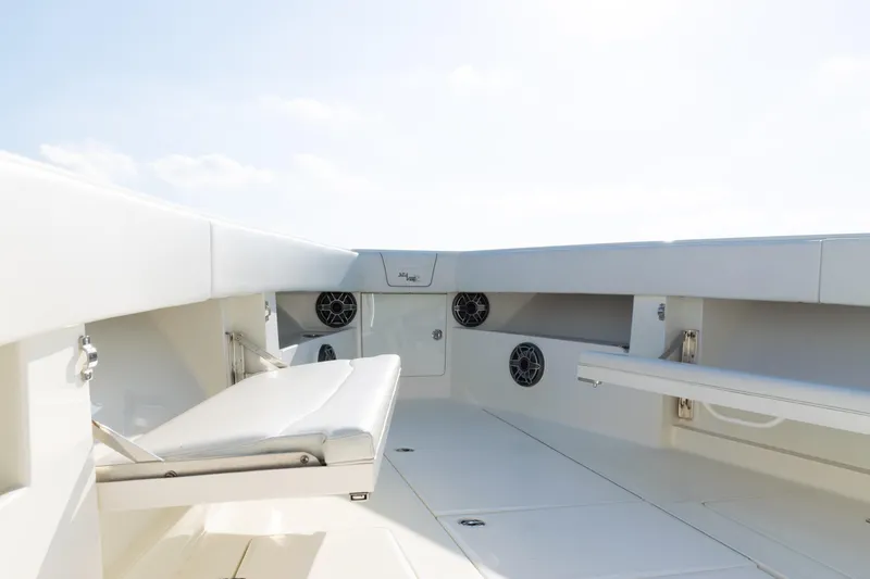 Slide: The Image of 2020 SeaVee 390Z boat interior with seating and speakers, showcasing modern design. - 9