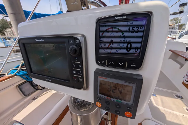 Slide: The Image of Cockpit navigation instruments on a 1988 Island Packet 38 sailboat. - 30