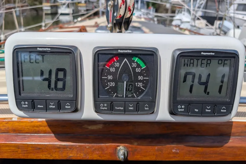 Slide: The Image of Raymarine instruments on 1988 Island Packet 38 showing depth, wind, and water temperature. - 31