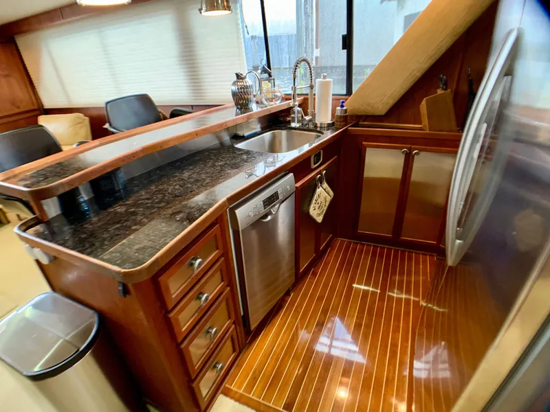 Slide: The Image of Interior view of 1988 Harbor Master 520 Coastal yacht kitchen. - 11