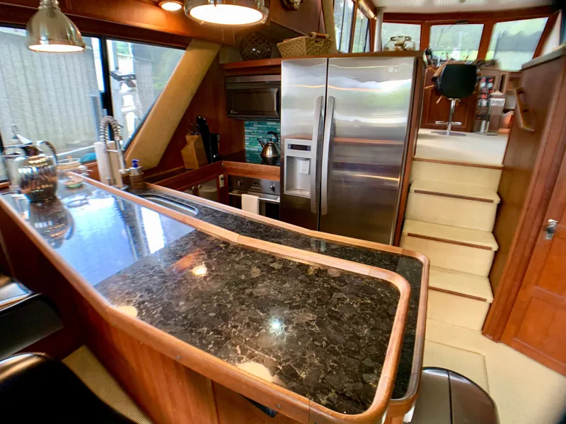 Slide: The Image of Interior of 1988 Harbor Master 520 Coastal yacht with modern kitchen. - 12