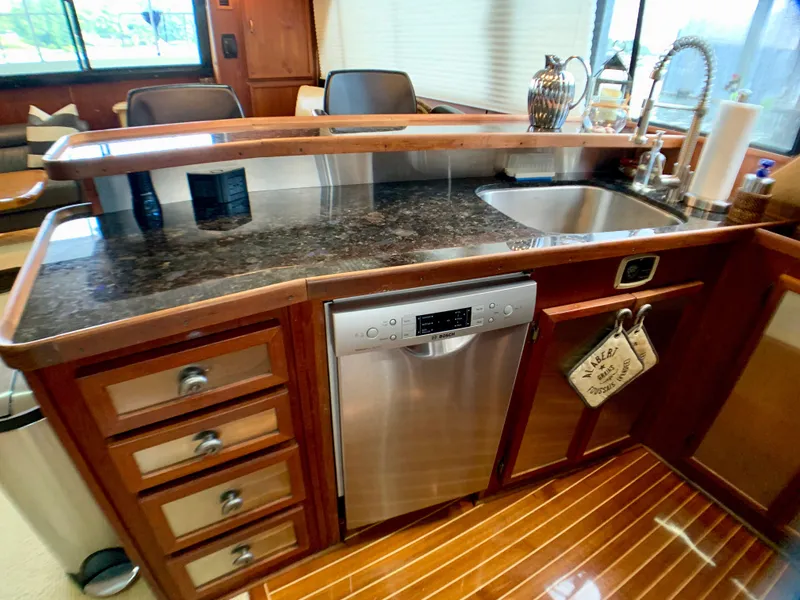 Slide: The Image of Kitchen area on a 1988 Harbor Master 520 Coastal boat. - 15