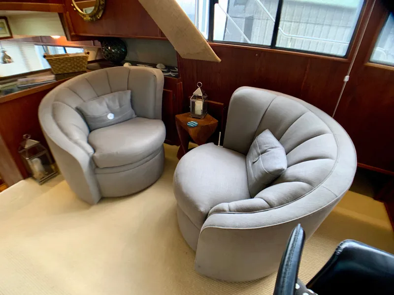 Slide: The Image of Interior of 1988 Harbor Master 520 Coastal with gray armchairs. - 21