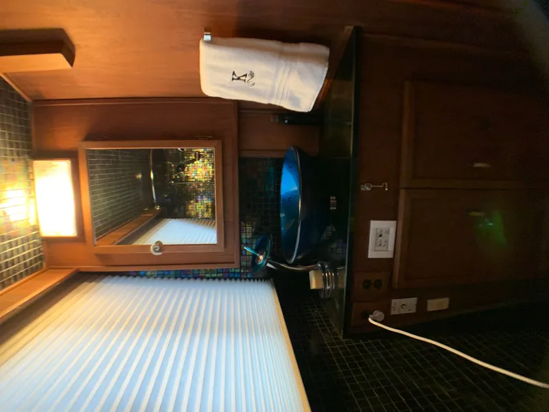 Slide: The Image of Bathroom in 1988 Harbor Master 520 Coastal with blue sink. - 35