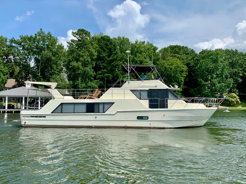 Slide: The Image of 1988 Harbor Master 520 Coastal Yacht on calm water. - 4