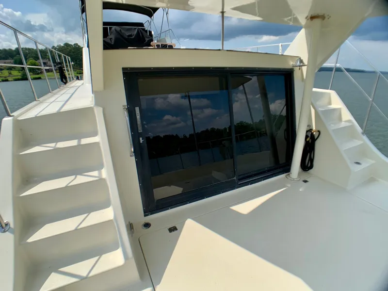Slide: The Image of 1988 Harbor Master 520 Coastal with exterior stairs and glass door. - 41