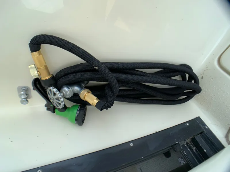 Slide: The Image of Black hose with brass fittings on a boat, Harbor Master 520 Coastal 1988. - 42