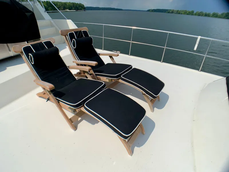 Slide: The Image of Two lounge chairs on 1988 Harbor Master 520 Coastal yacht deck. - 45