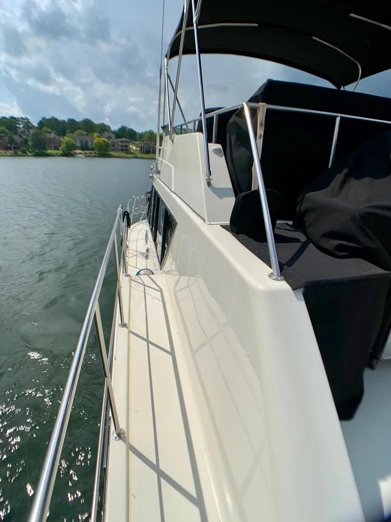 Slide: The Image of 1988 Harbor Master 520 Coastal yacht on calm waters. - 46