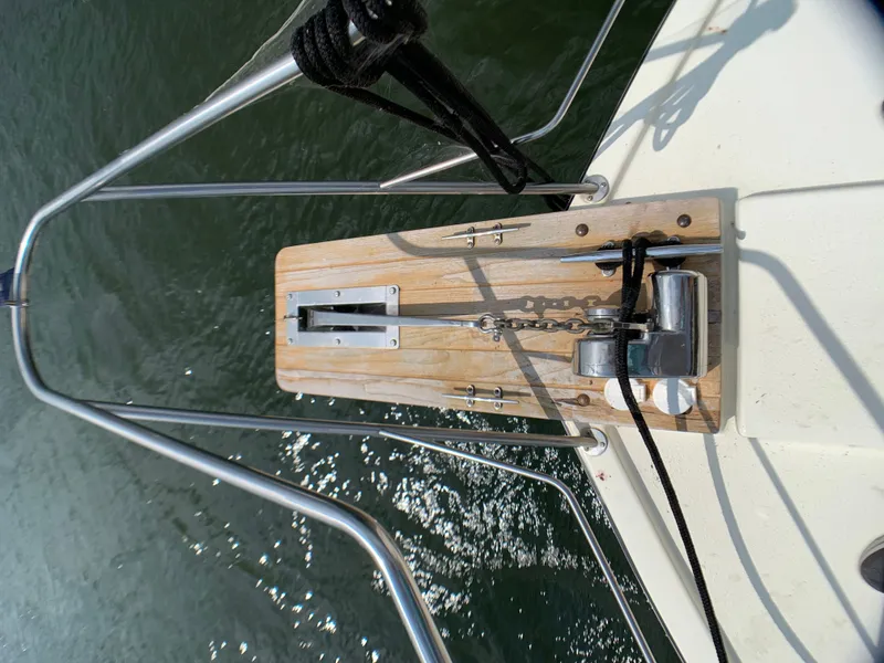 Slide: The Image of Bow of a 1988 Harbor Master 520 Coastal boat with anchor windlass. - 48